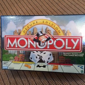 New Never Used Monopoly Game Deluxe Edition